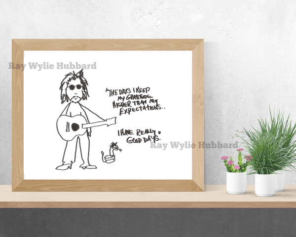 Framed artwork with a black and white illustration of a person playing guitar on a white background.